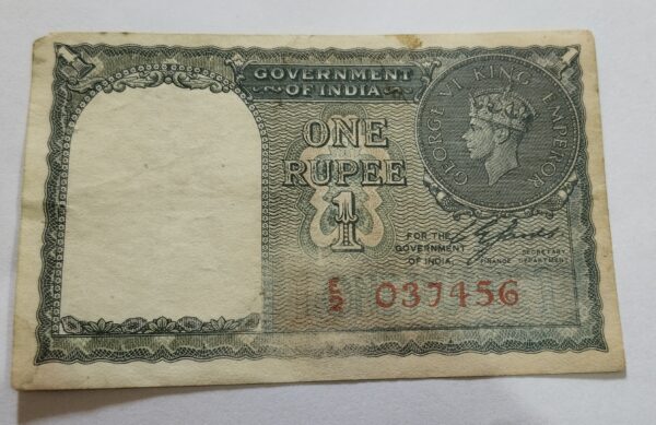 One rupees ce jones red serial number Bank note paper money 