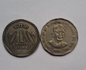 Two pics rare coins1991 dot and two rs chiranjan das 1998 star