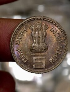 Five rupees mahatma baseswar rainbow  toned  coin with m mint mark