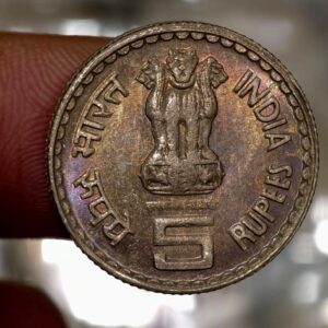 Five rupees mahatma baseswar rainbow  toned  coin with m mint mark