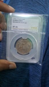 One rupees 1980  magnatic graded coin